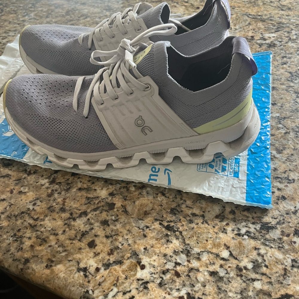 On Cloud Gray and White Sneakers